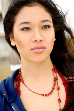 Annie Tee in "Oriental Brunette Babe Annie Tee Posing Outdoor" via 24mainstreet